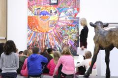 Children looking at arts display