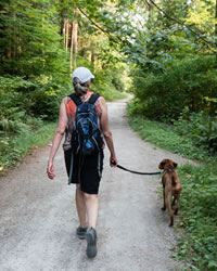 woman walking with dog