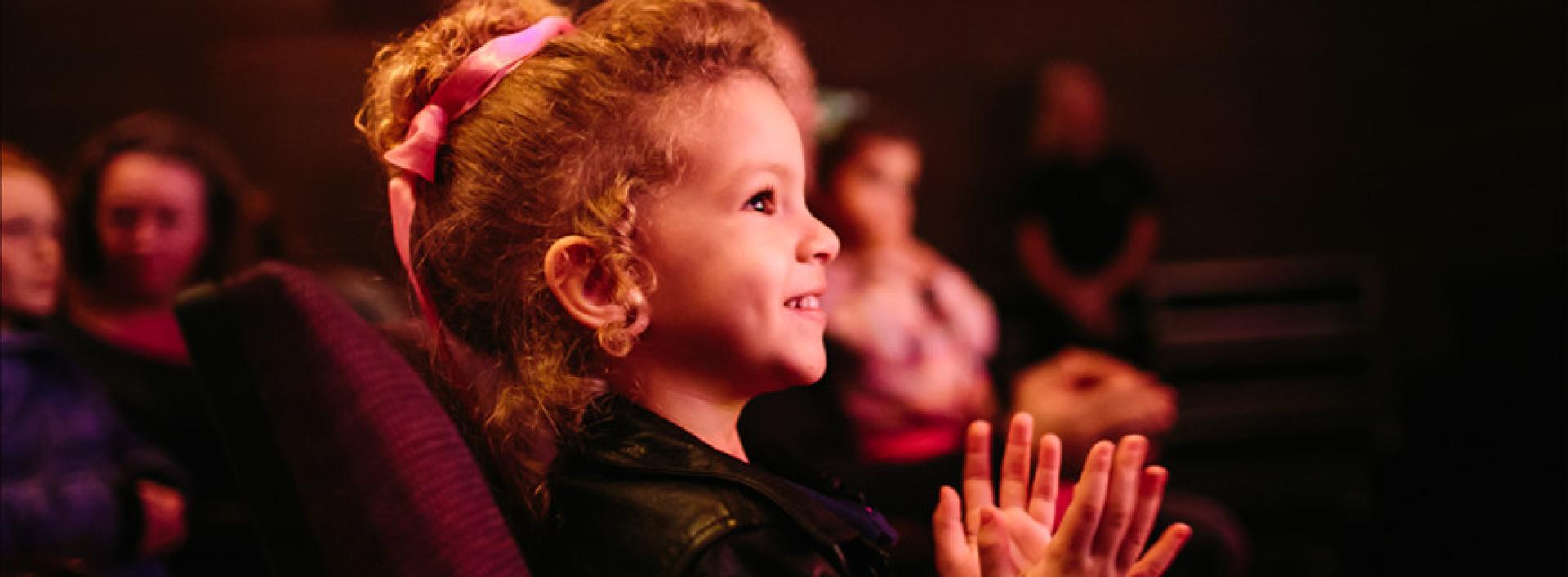 Child enjoying a performance