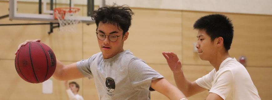 Youth playing basketball