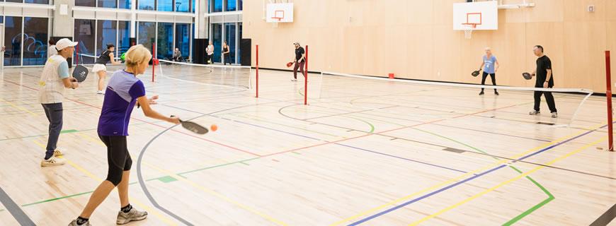 People playing pickleball