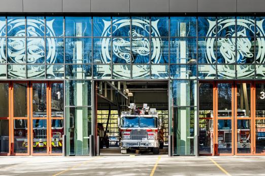 Firetruck under public art windows