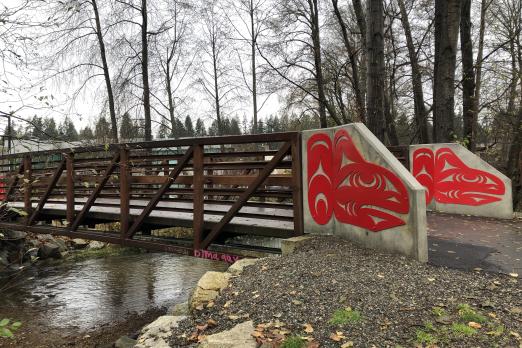 Red Salmon Panels on foot bridge (indigenous art)