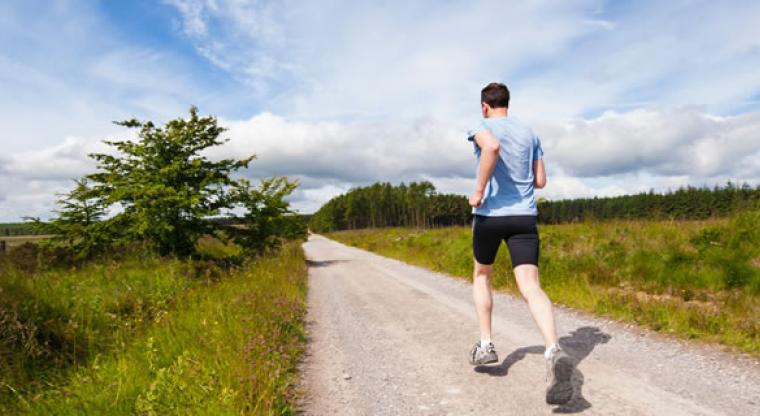 Man running along a path