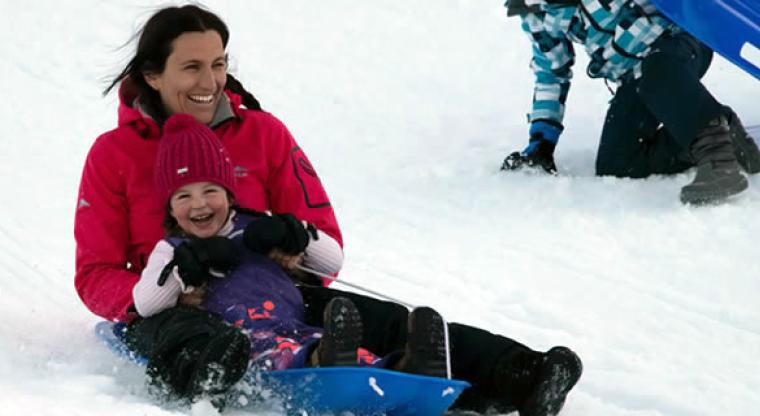 Family tobogganing